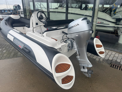 Xc pro 390 Deluxe met Honda 20pk tender