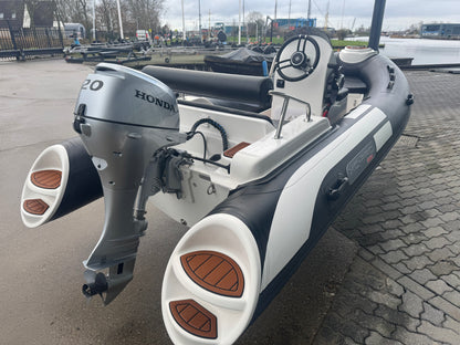 Xc pro 390 Deluxe met Honda 20pk tender