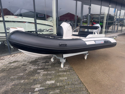 Xc pro 390 Deluxe met Honda 20pk tender